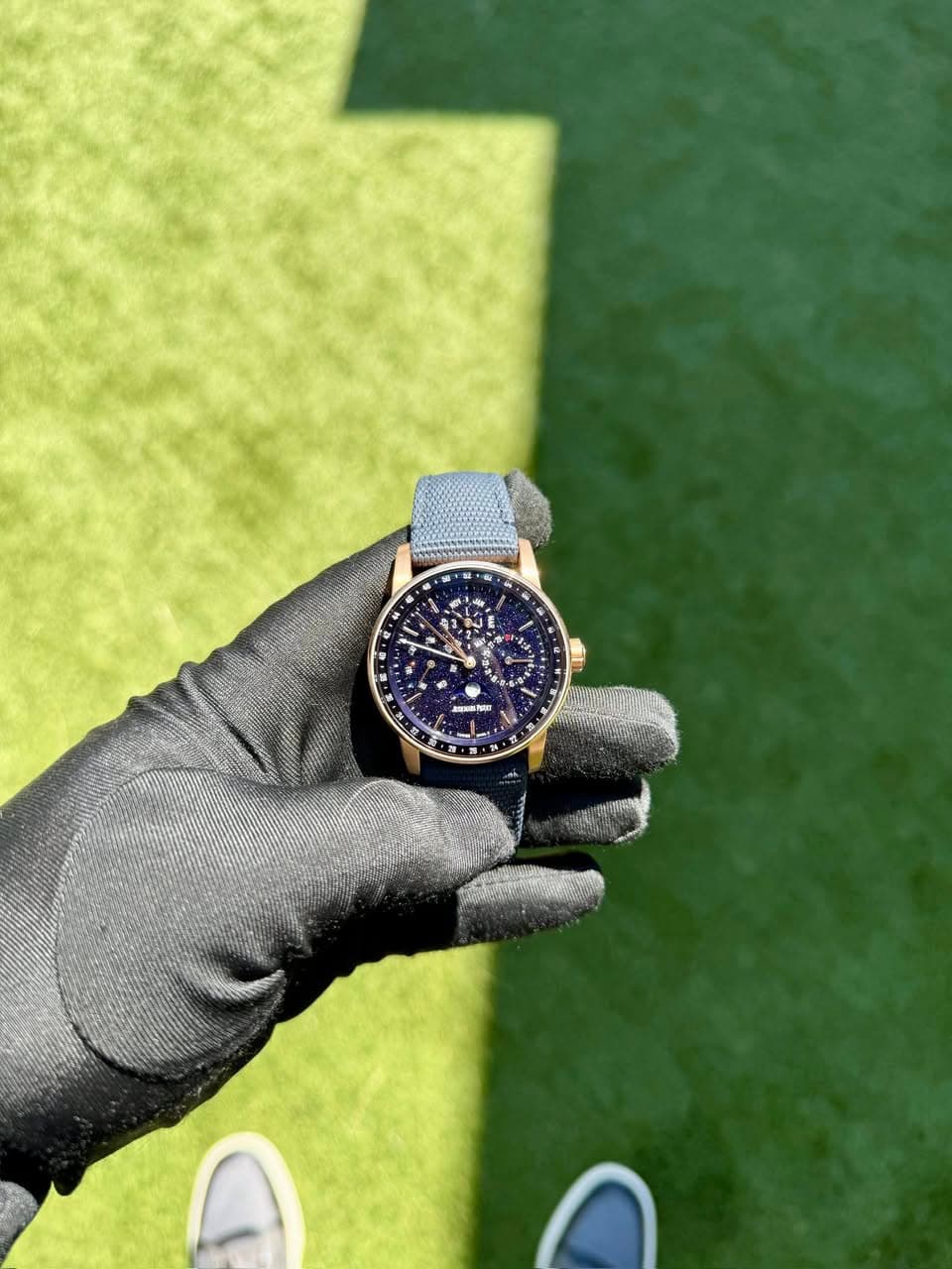 May be an image of wrist watch and text