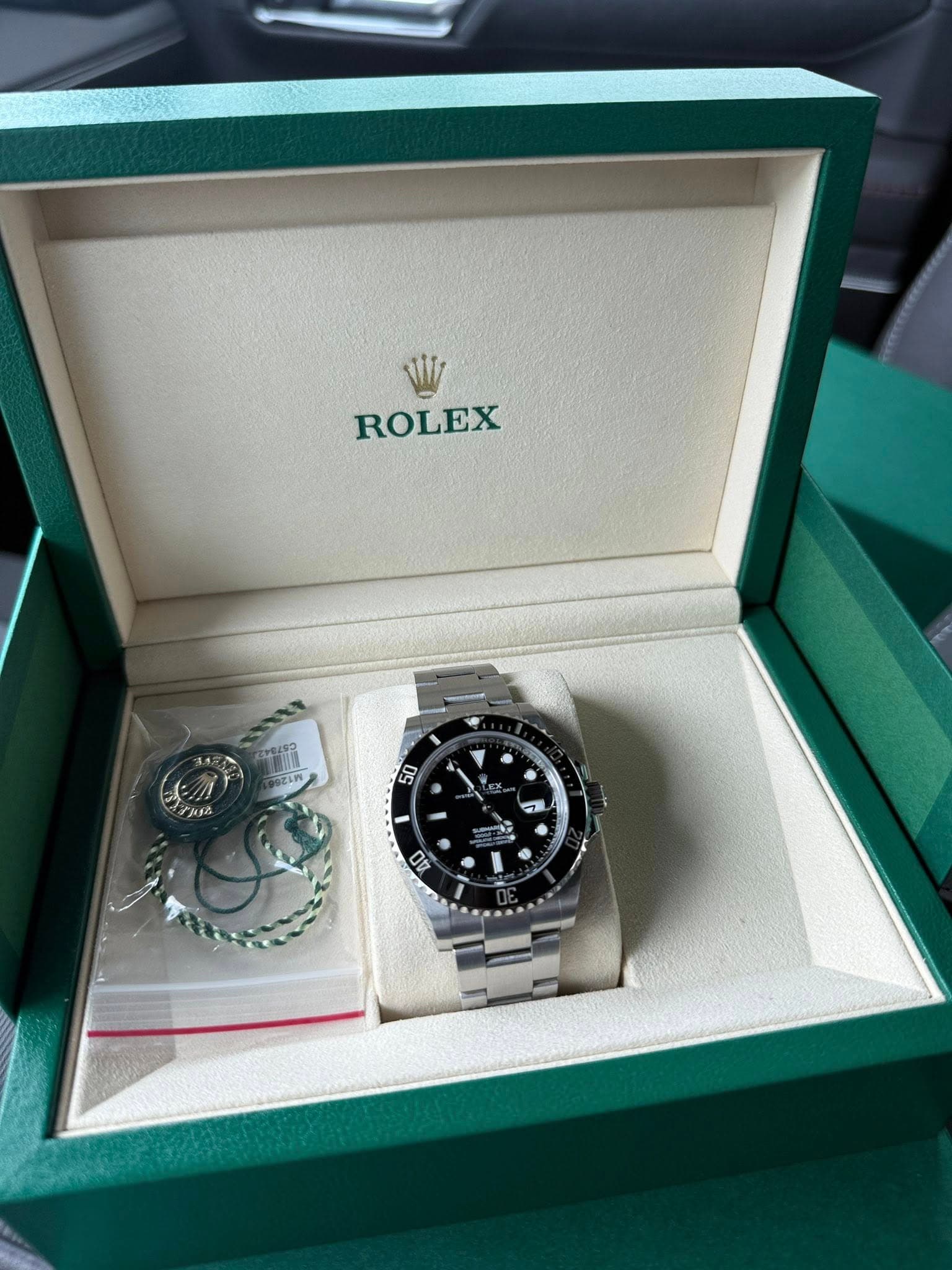 May be an image of wrist watch and text