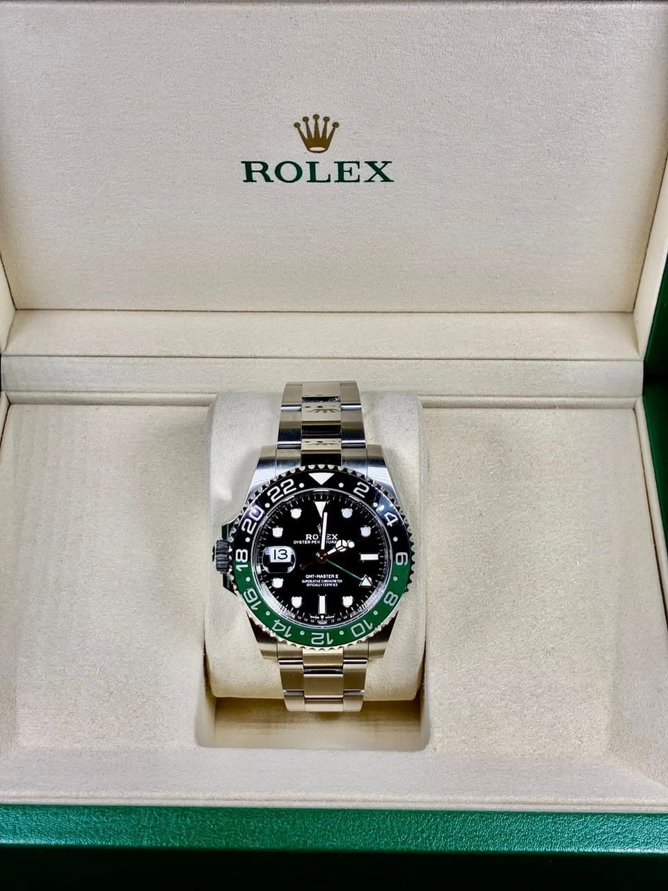 May be an image of wrist watch and text