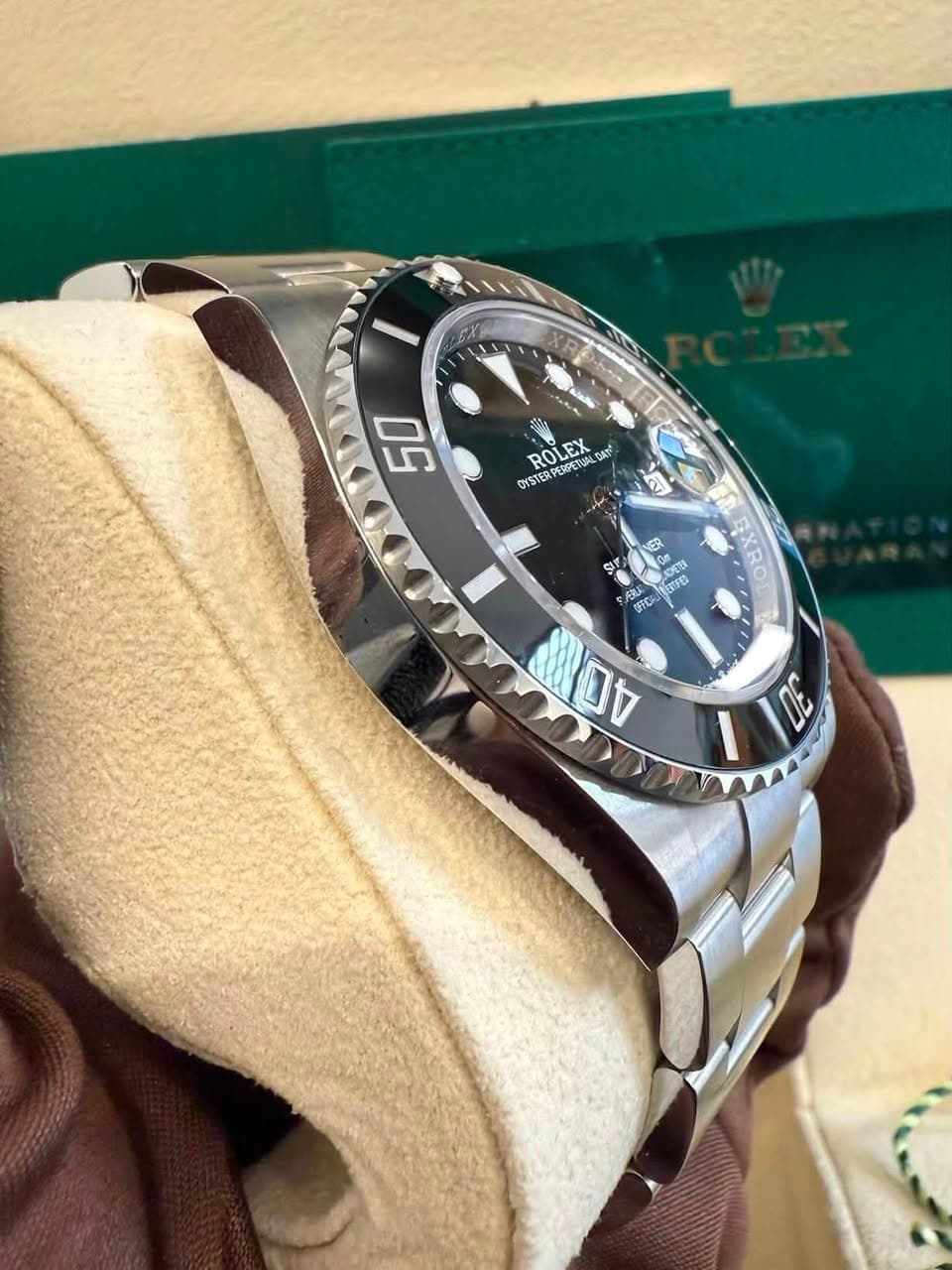 May be an image of wrist watch and text
