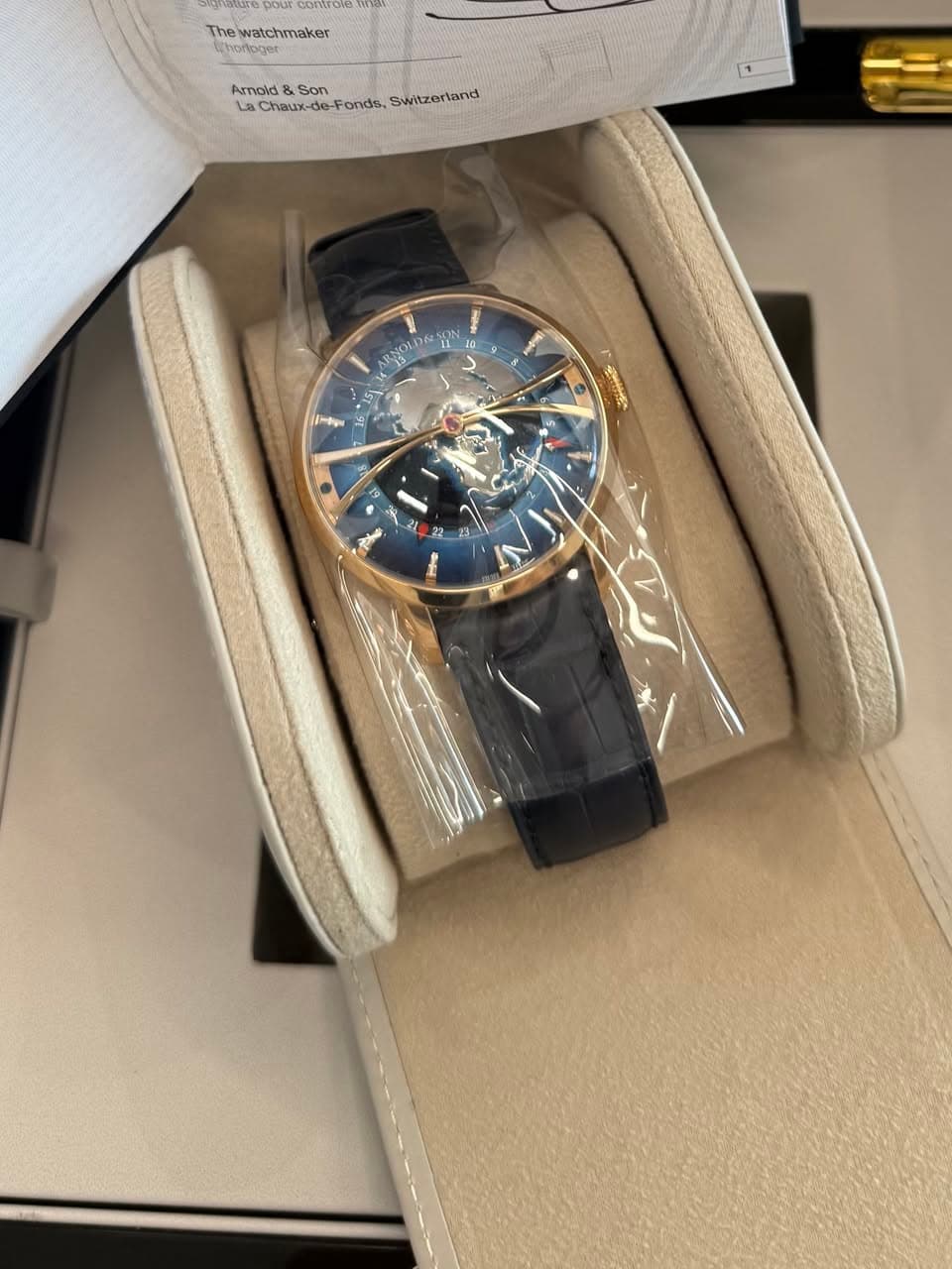 May be an image of wrist watch and text