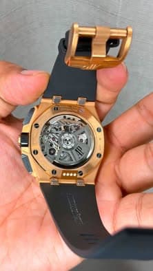 May be an image of wrist watch and text