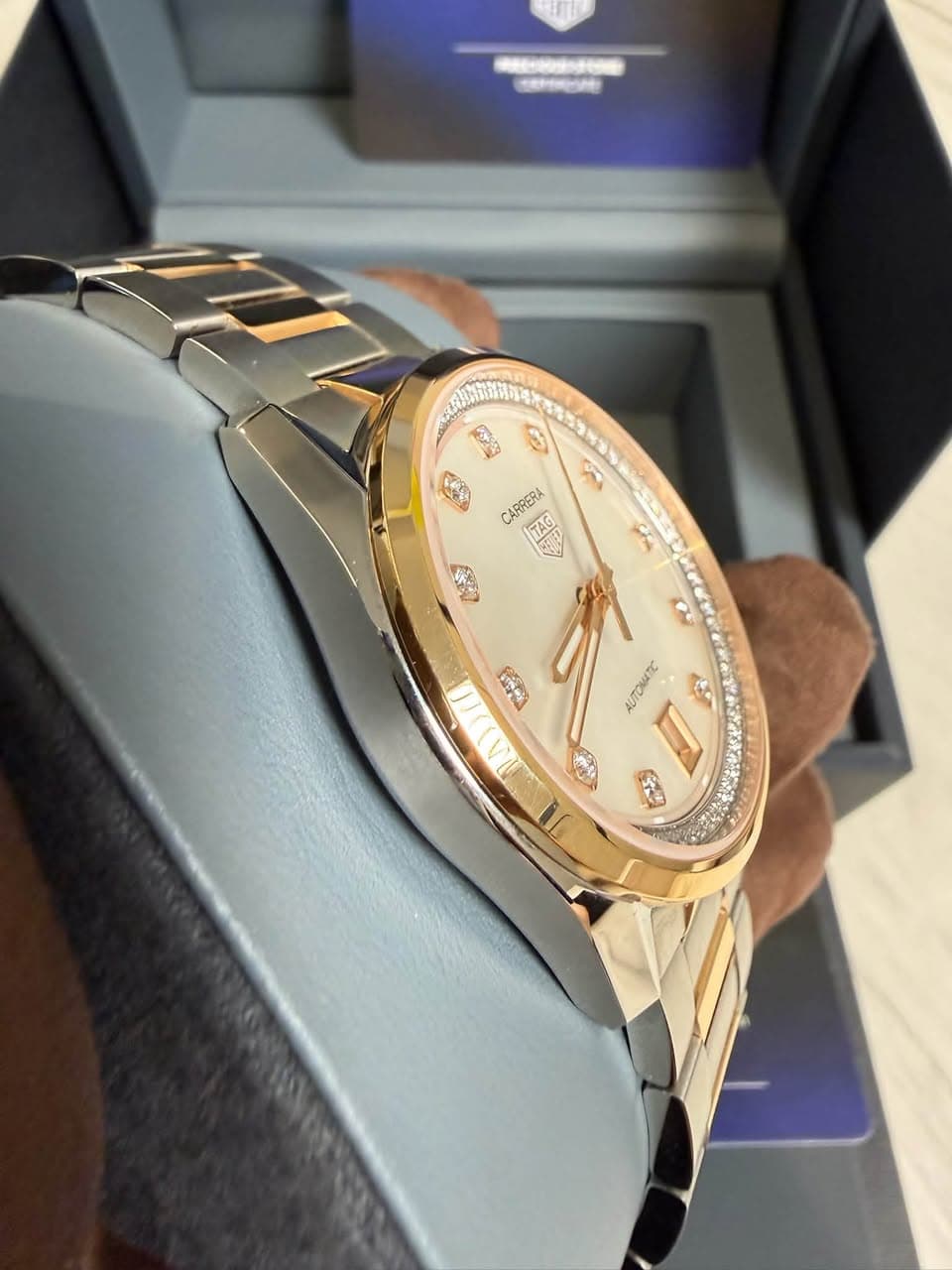 May be an image of wrist watch and text