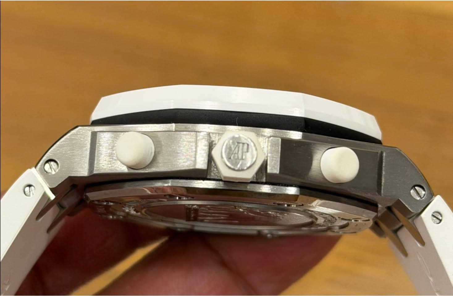 May be an image of wrist watch and text