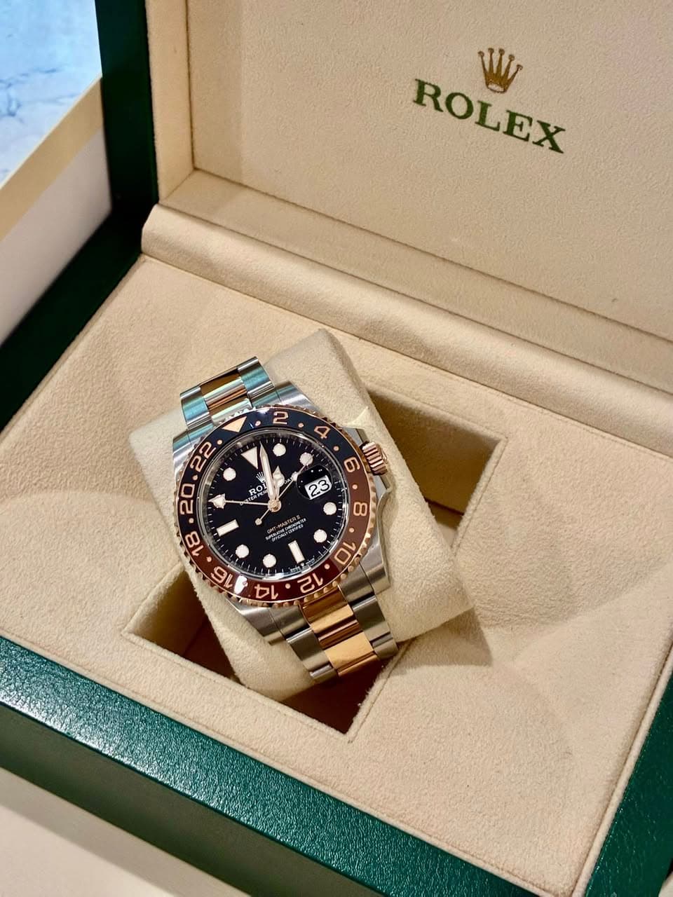 May be an image of wrist watch and text