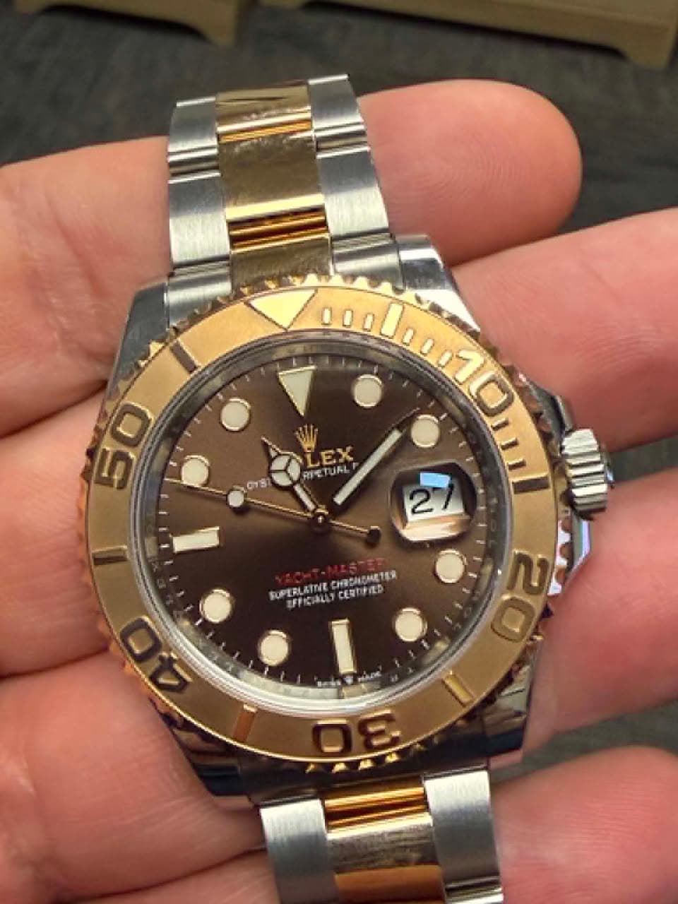 May be an image of wrist watch and text
