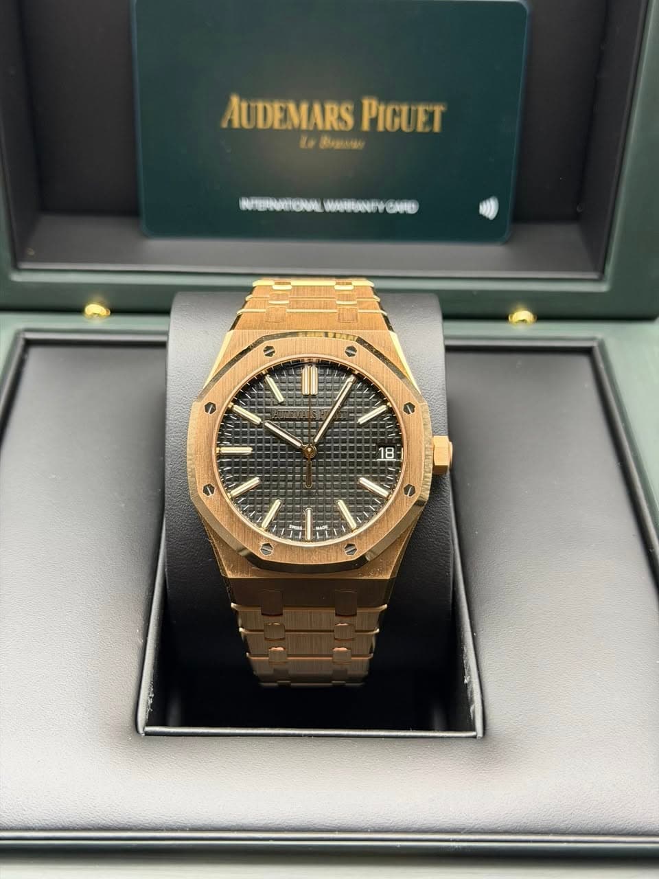 May be an image of wrist watch and text