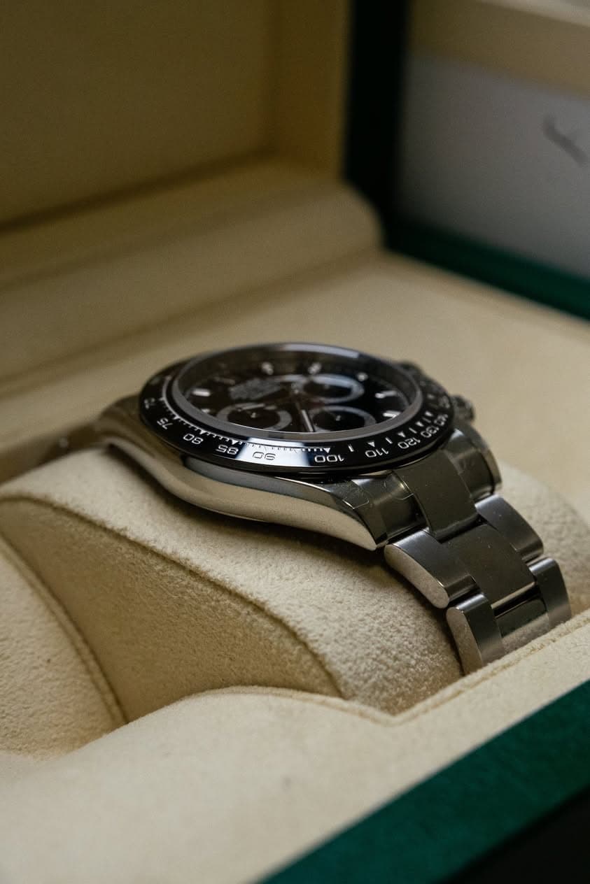 May be an image of wrist watch and text