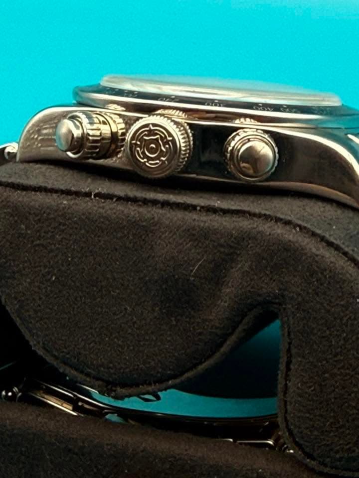 May be an image of wrist watch and eyewear