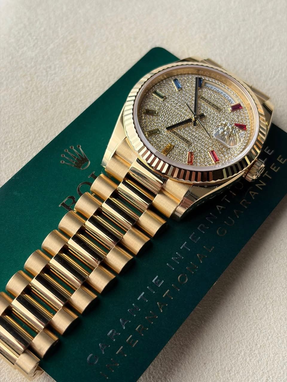 May be an image of wrist watch and text