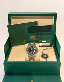 May be an image of wrist watch and text that says 'ROL t 00 20 O 0E 銇椼仾'