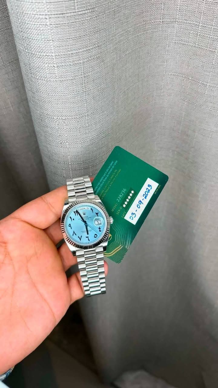 May be an image of digital watch and text that says 'cait lis ፍያ 2E MODEY DA MER< 青西*** ١۰ LII 9 ααπ - - ع ο'