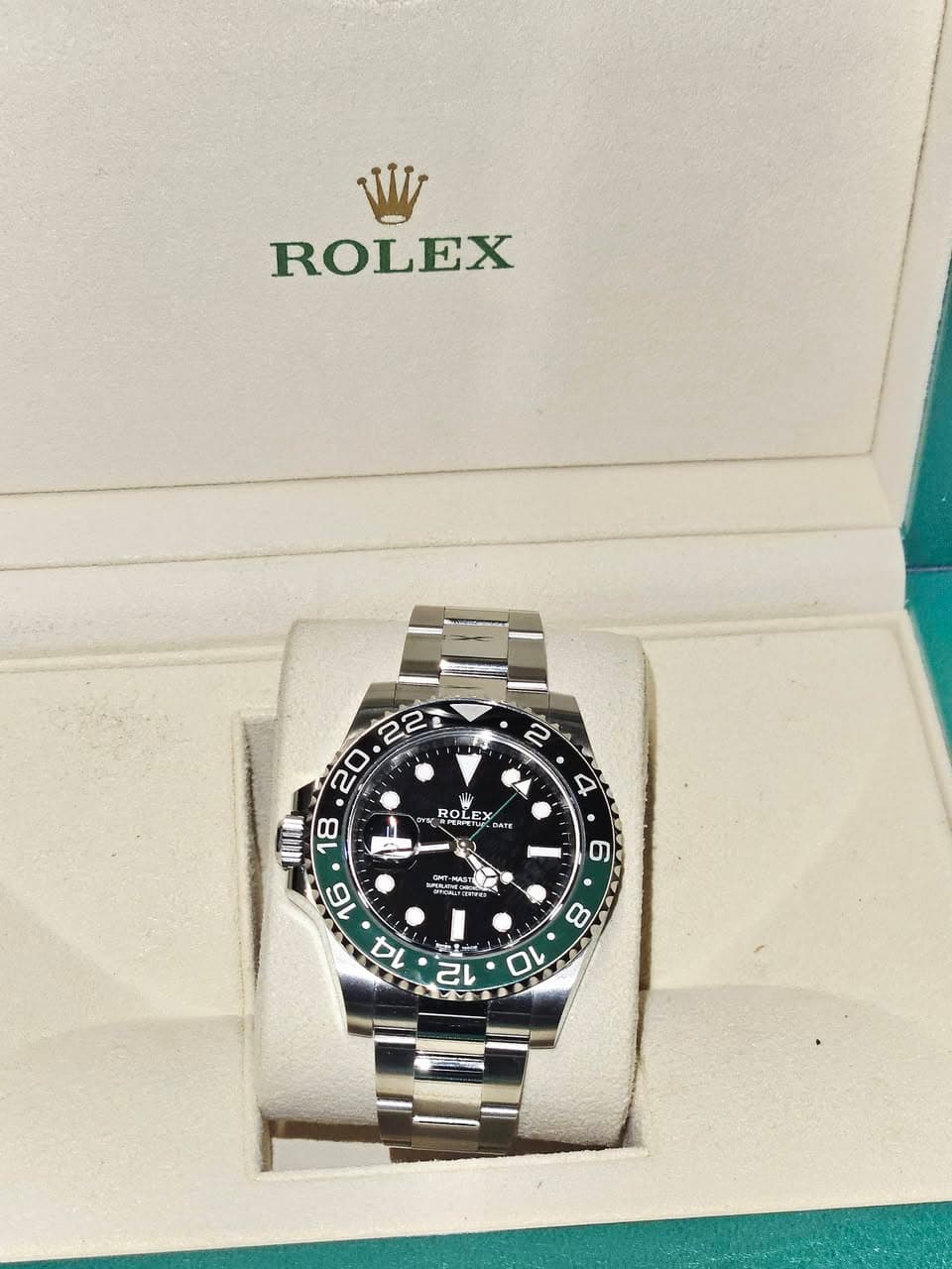 May be an image of wrist watch and text