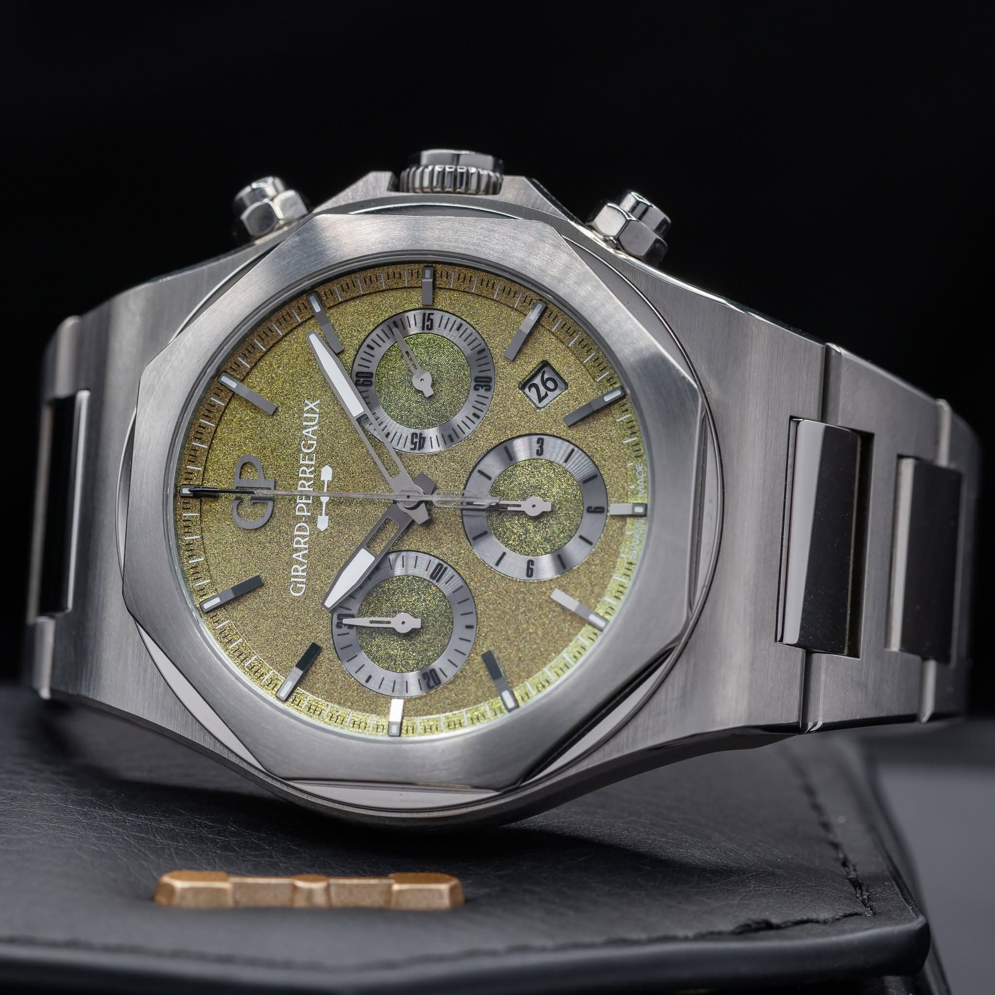 May be an image of wrist watch and text