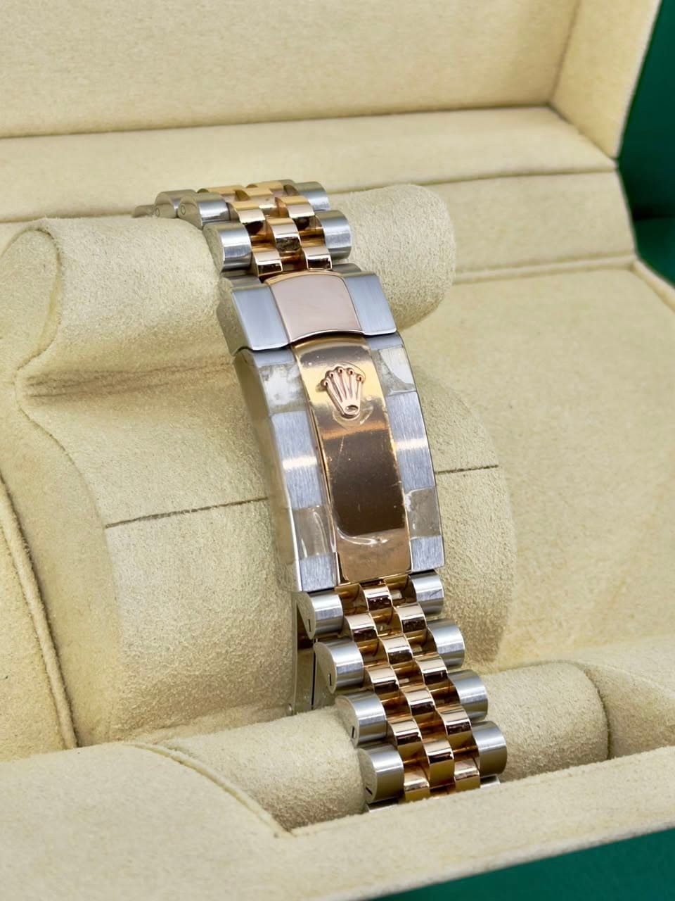 May be an image of wrist watch and jewelry