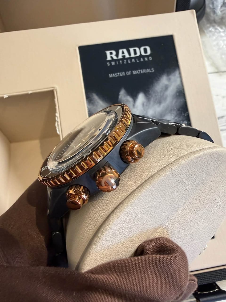 May be an image of wrist watch and text