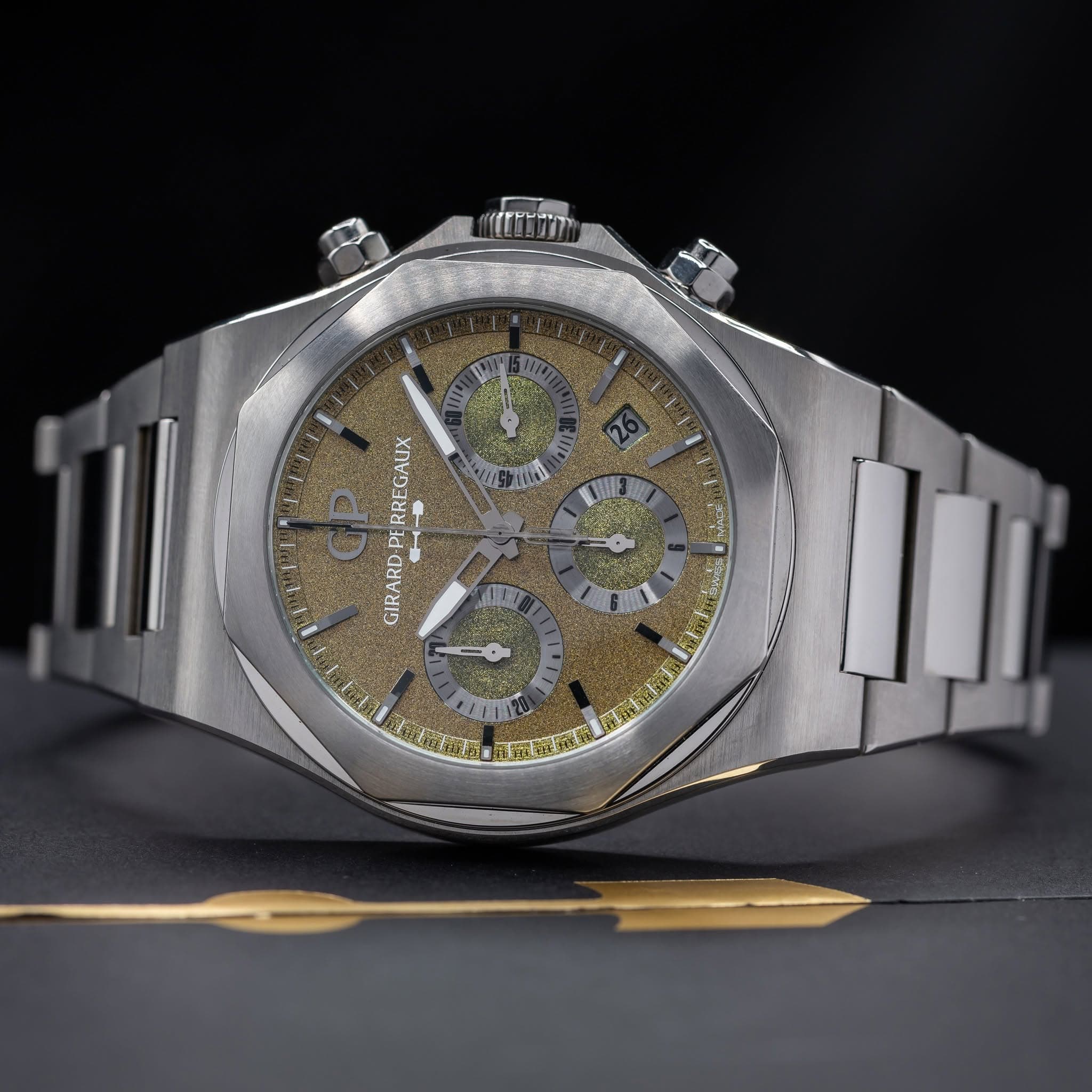 May be an image of wrist watch and text