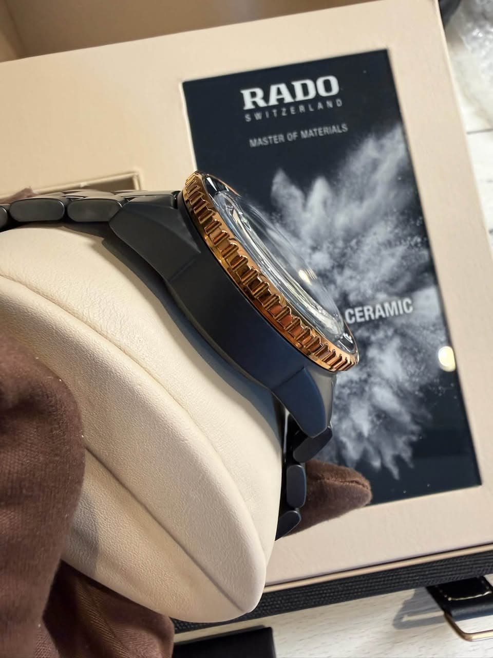 May be an image of wrist watch and text that says 'RADO SWITZERLAND ITZERLAND MASTERO MASTEROFMATERIALS F MATERIALS OF CERAMIC'
