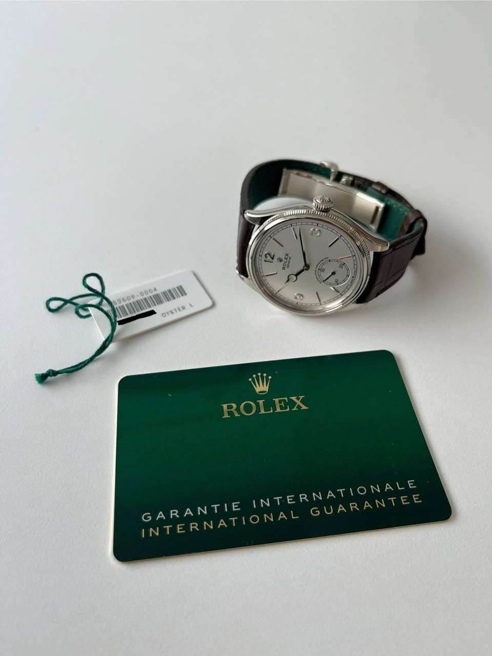 May be an image of wrist watch and text