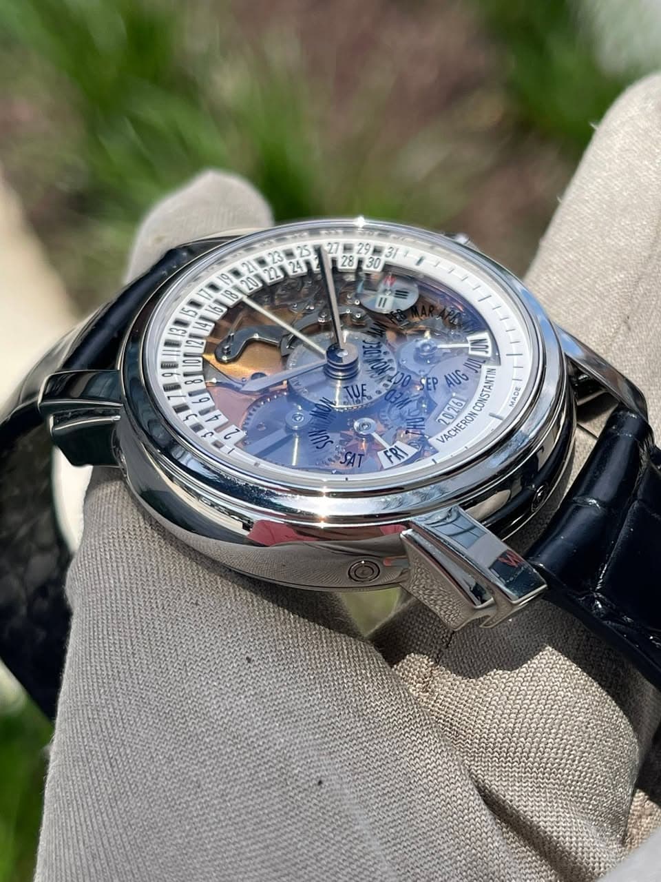 May be an image of wrist watch and text
