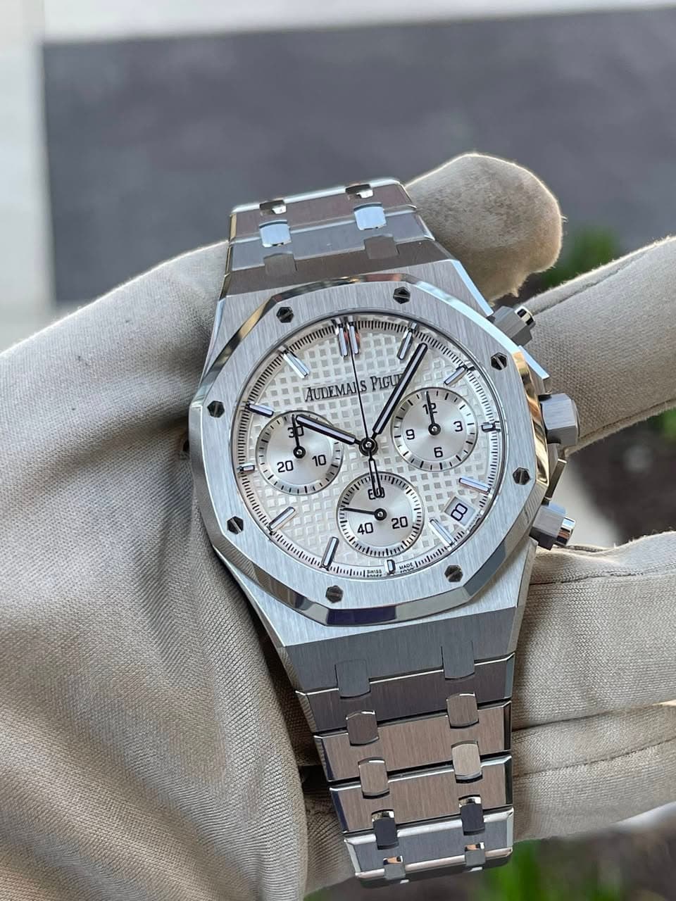 May be an image of wrist watch and text