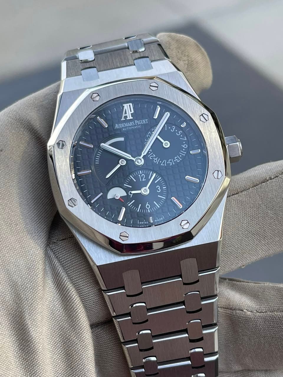 May be an image of wrist watch and text