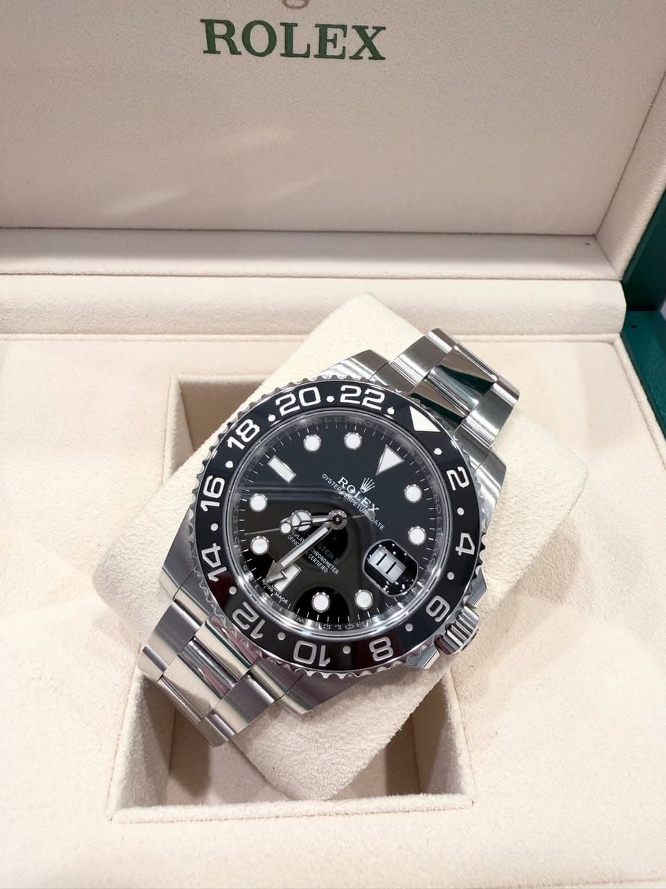 May be an image of wrist watch and text