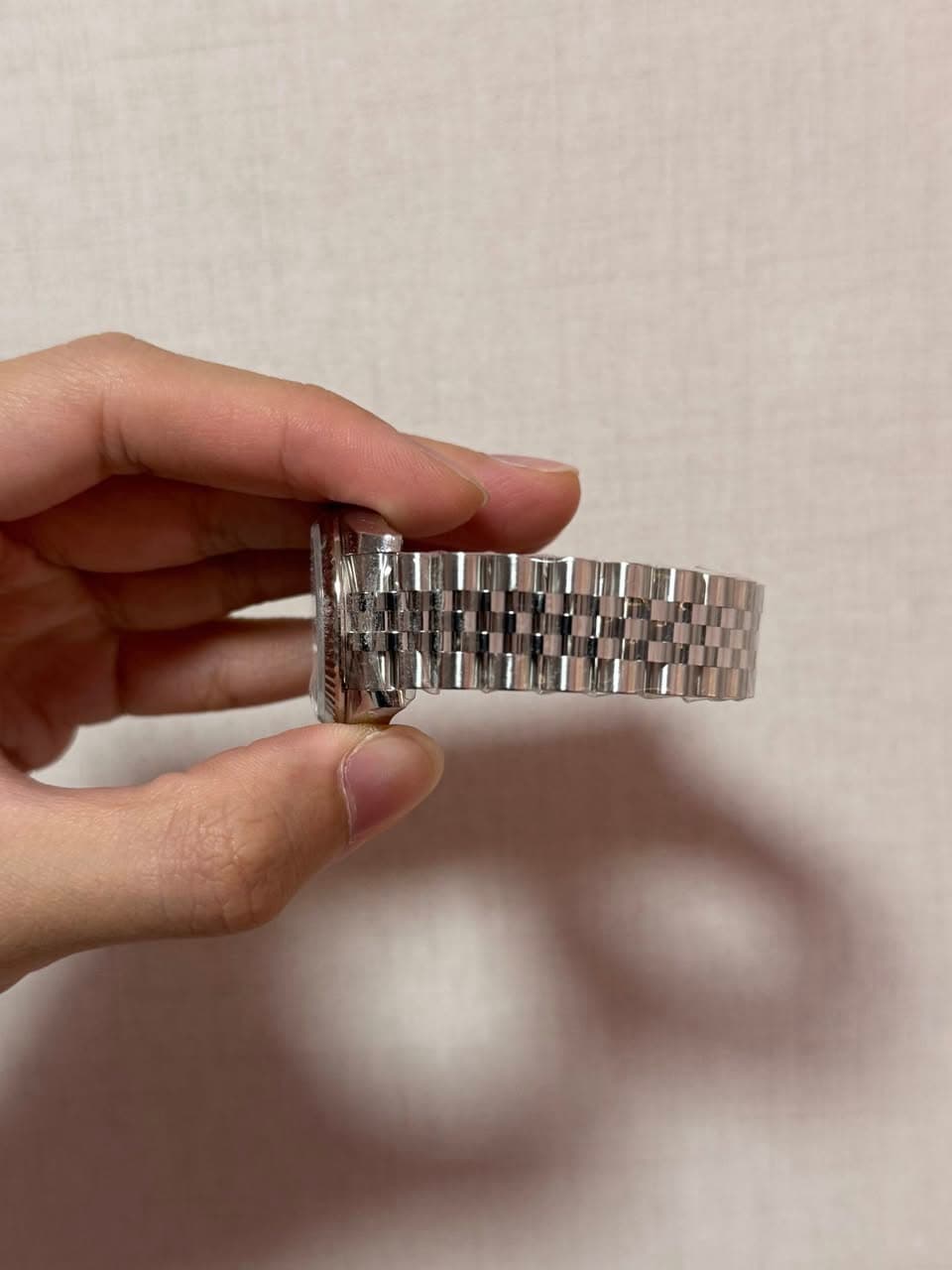 May be an image of wrist watch