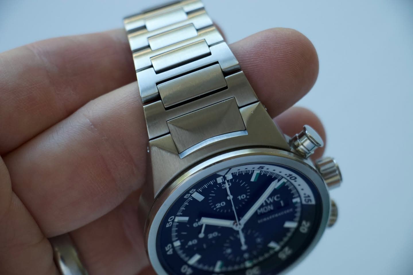 May be an image of wrist watch and text