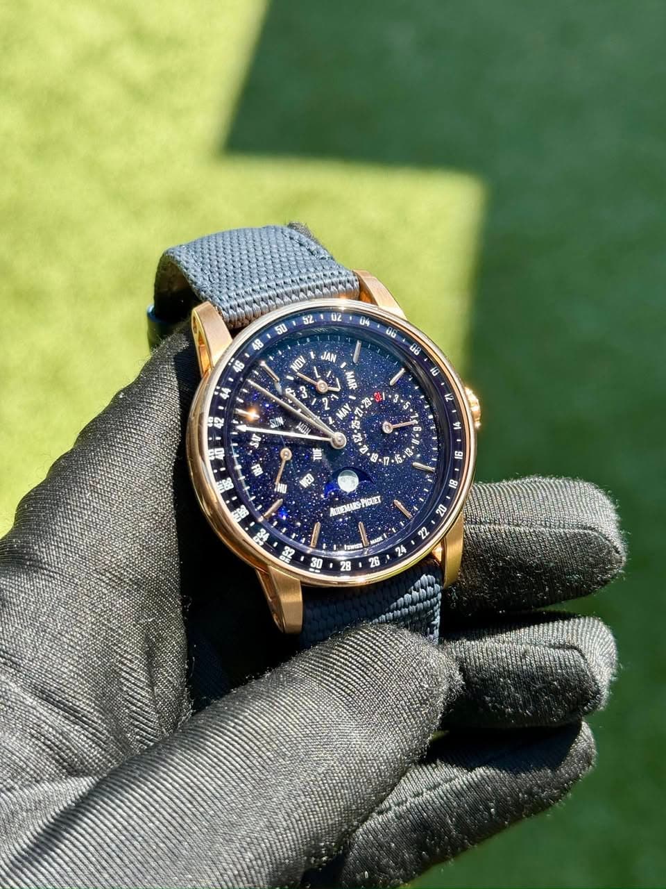 May be an image of wrist watch and text