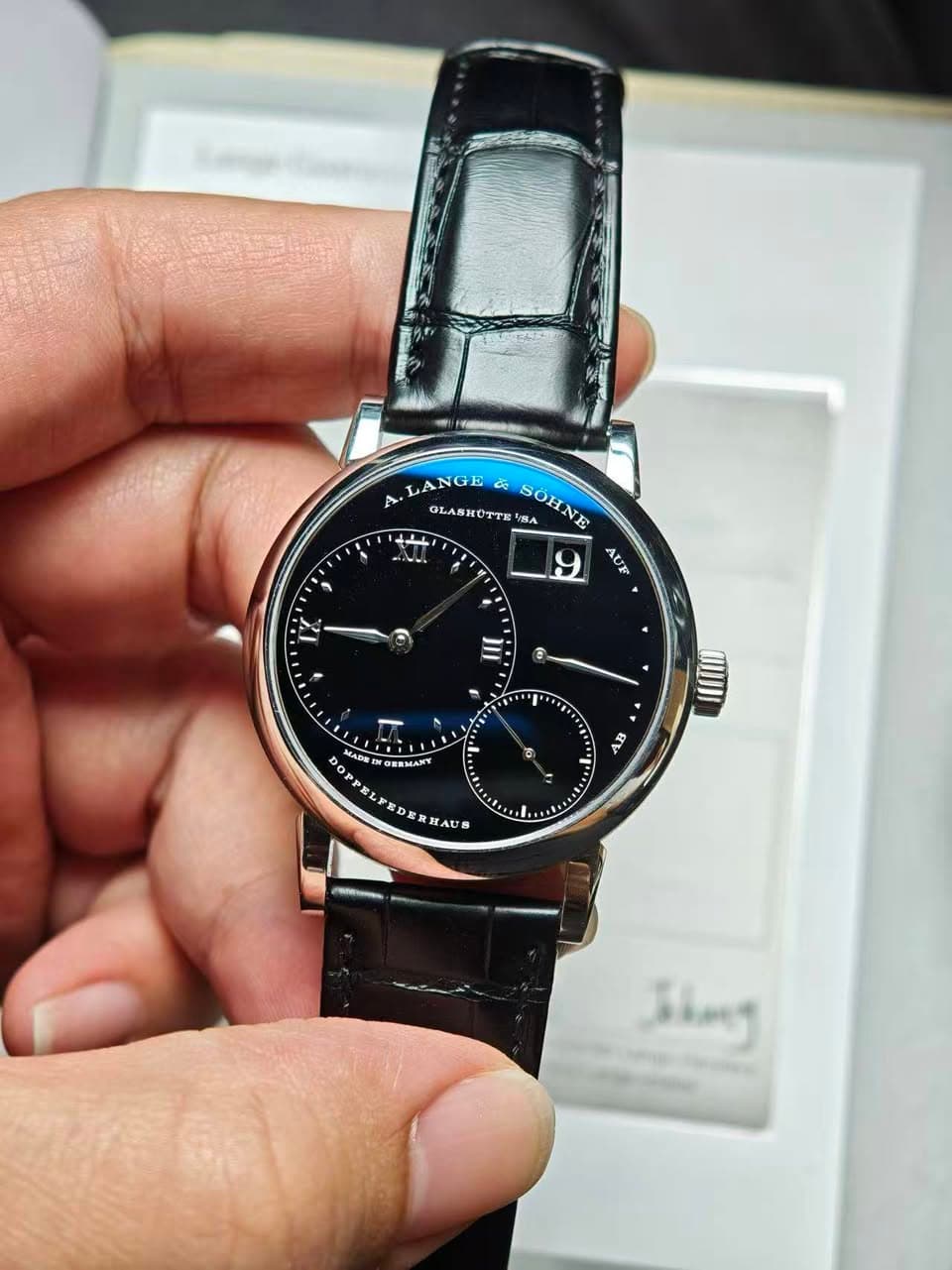 May be an image of digital watch and text