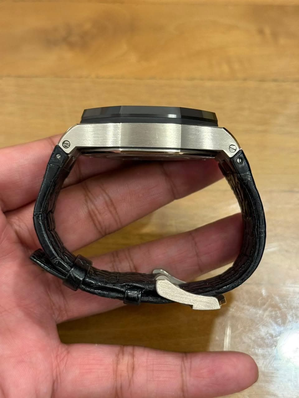May be an image of digital watch and text