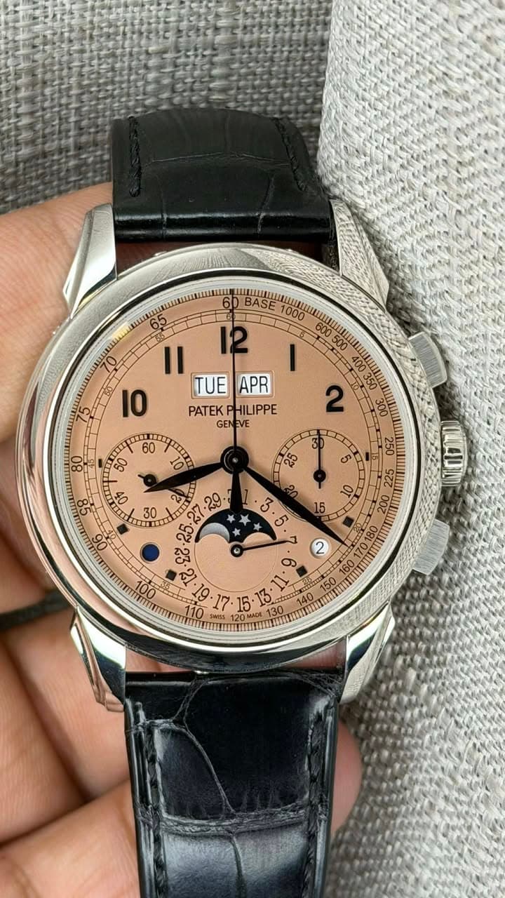 May be an image of wrist watch and text that says 'BASE 1000 65 II I0 TUE APR PATEKP PATEKPHILIPPE HILIPPE GEN GENEVE VE mEE ဟ E OO ಪರಿ 2 O 100% 15' 15 140 SWSS 200 130'