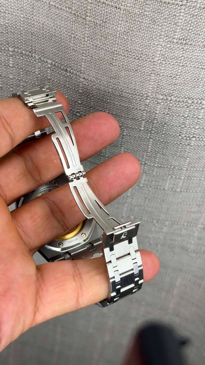 May be an image of digital watch and text