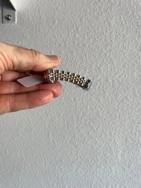 May be an image of wrist watch
