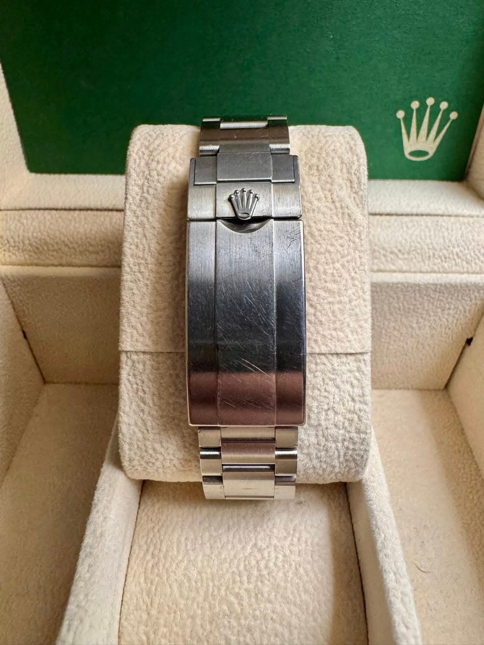 May be an image of wrist watch and text