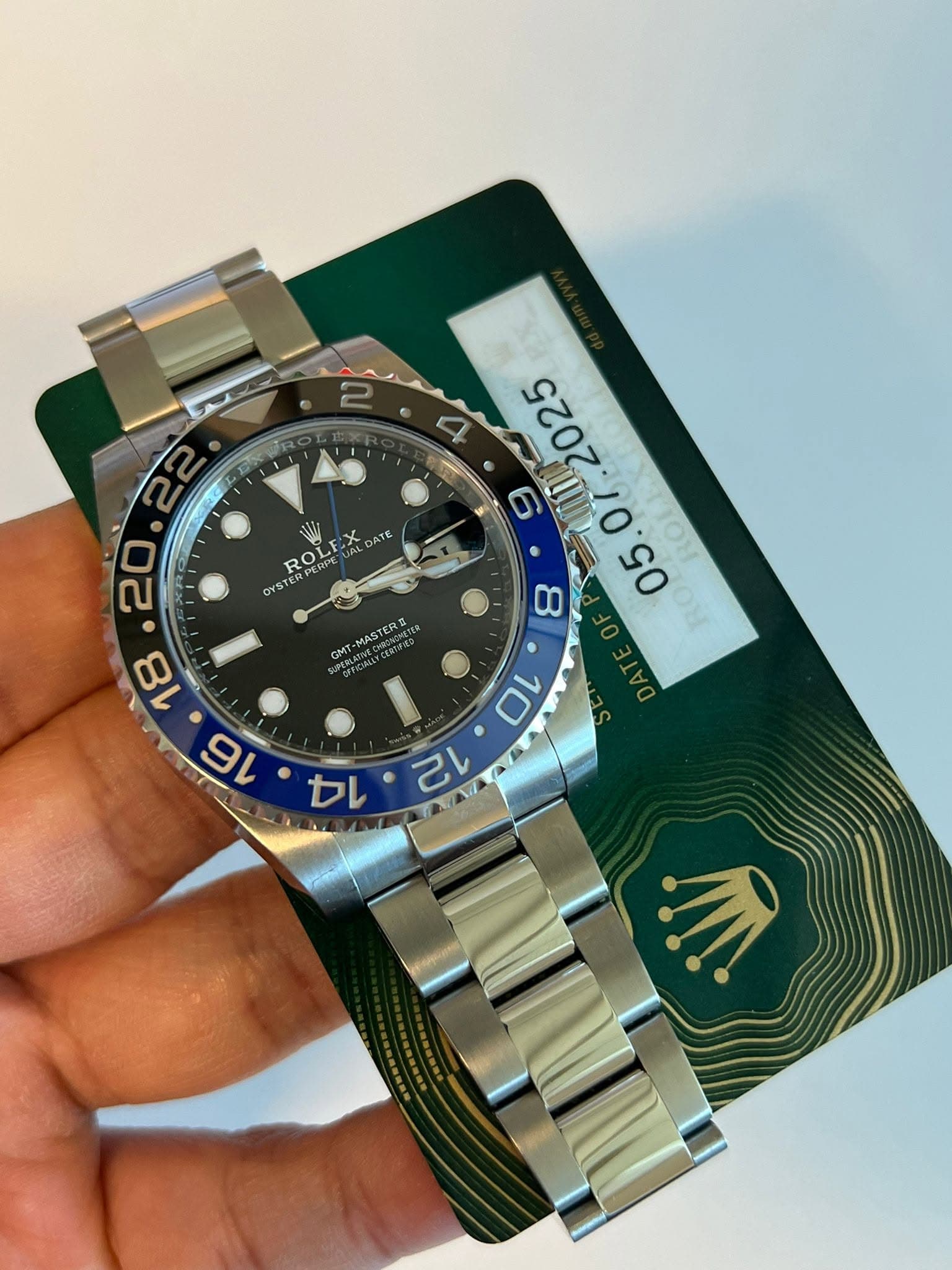 May be an image of wrist watch and text