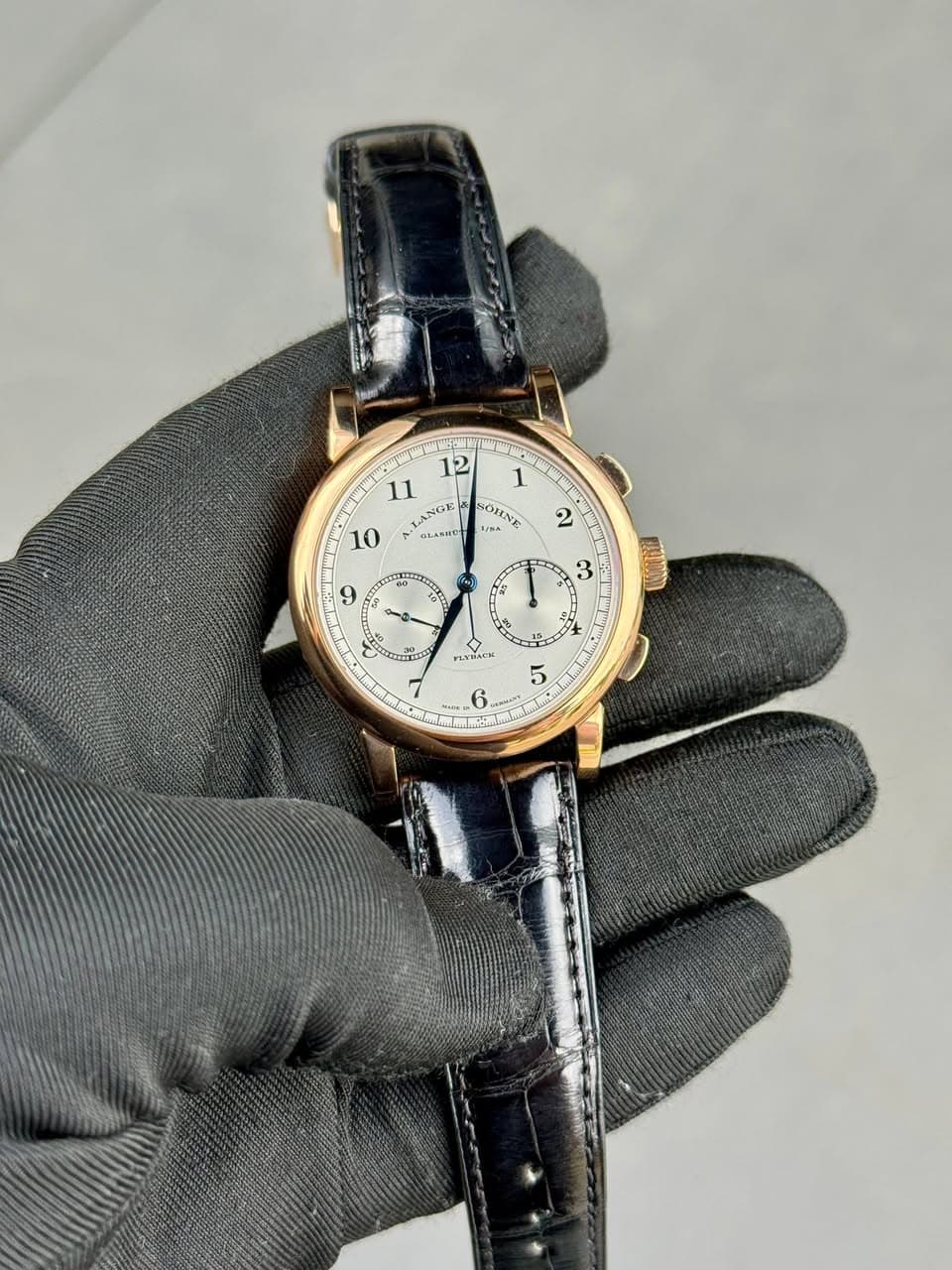 May be an image of wrist watch and text