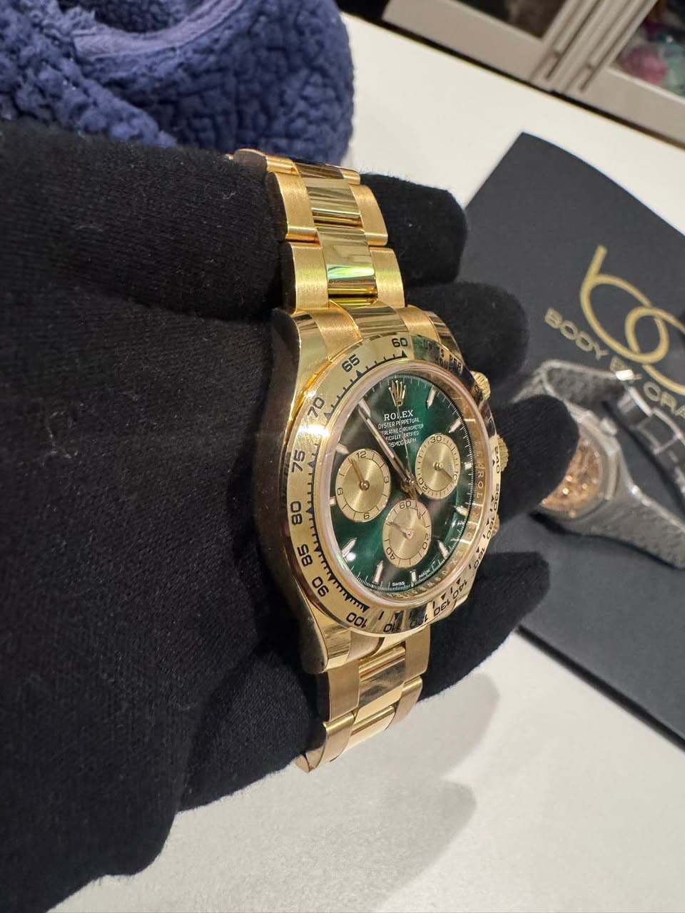 May be an image of wrist watch and text