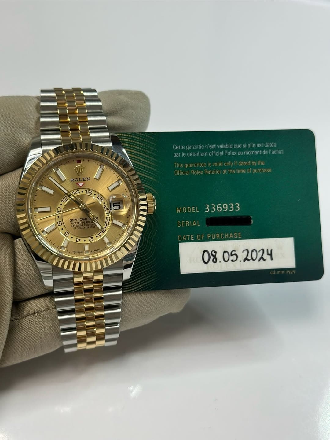 May be an image of wrist watch and text