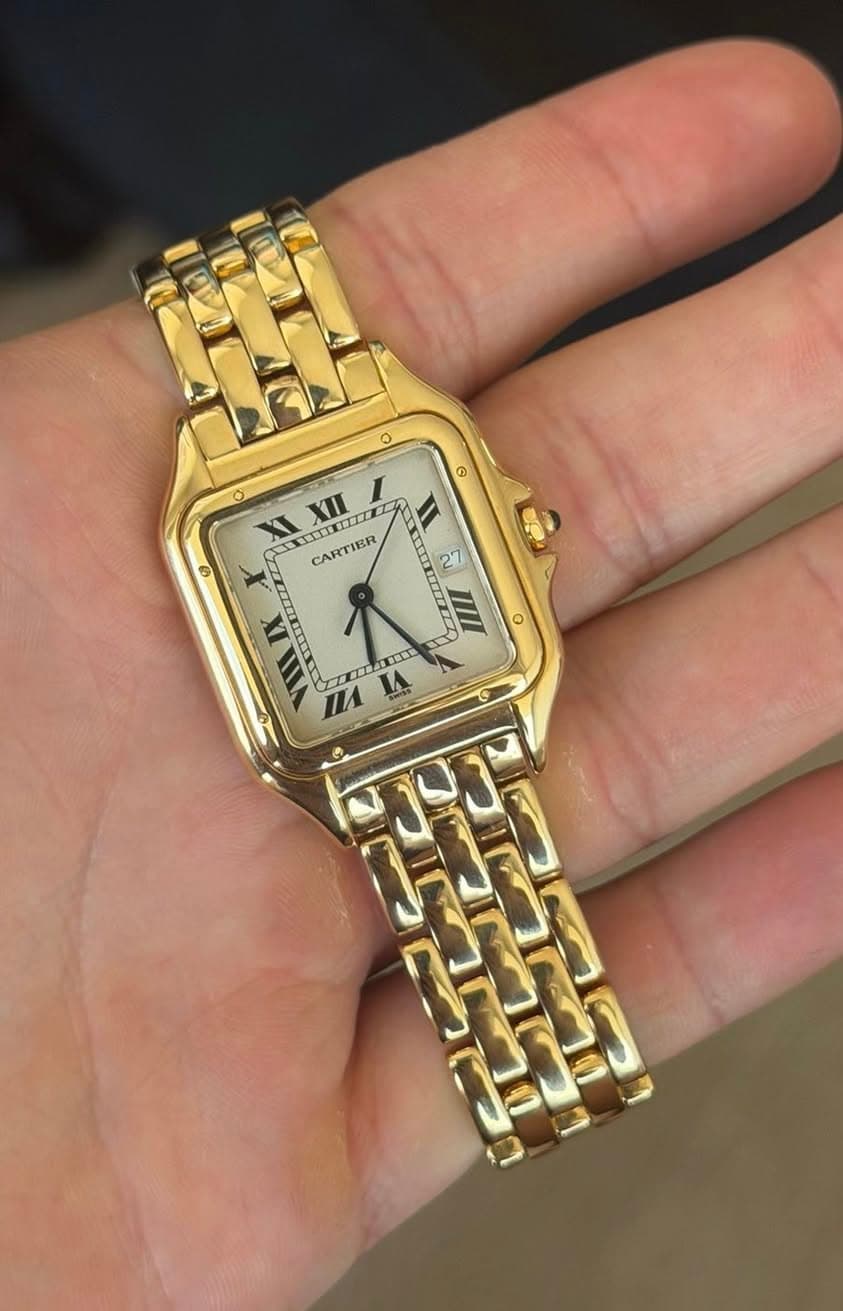 May be an image of digital watch and text