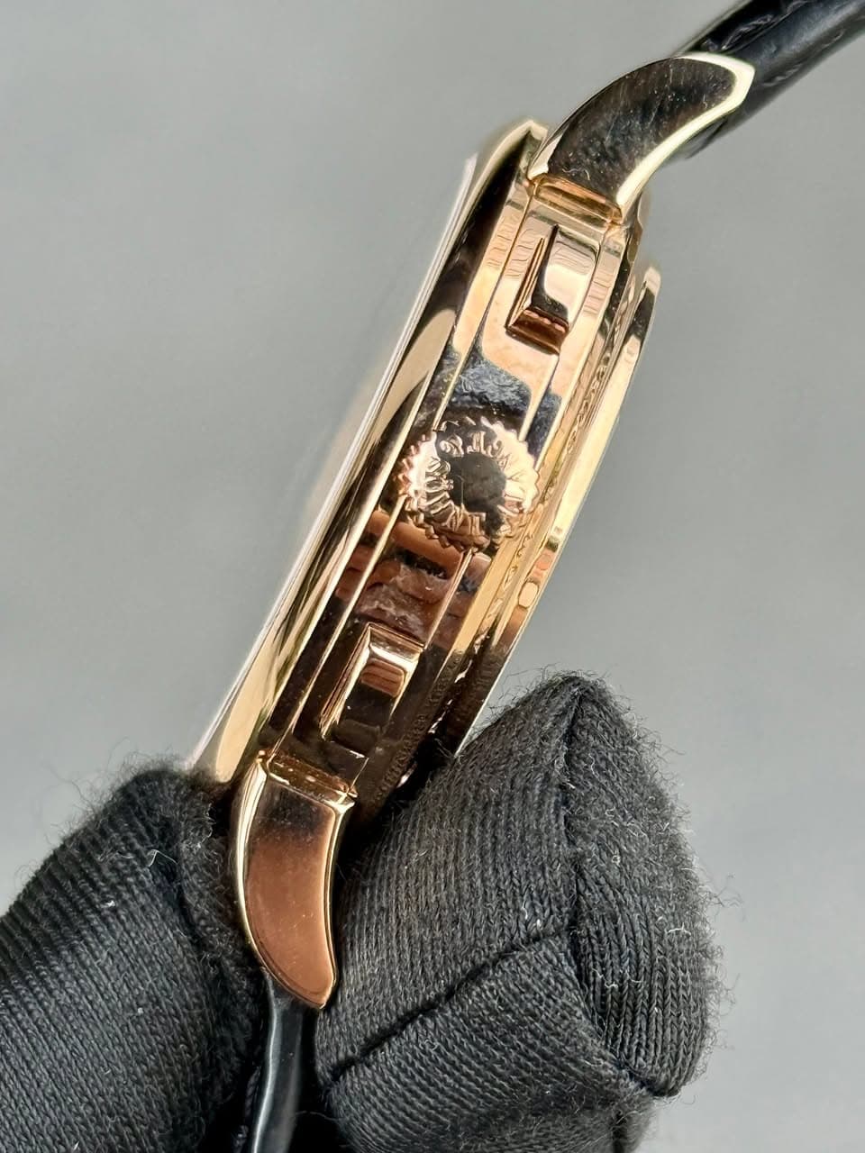 May be an image of wrist watch and text