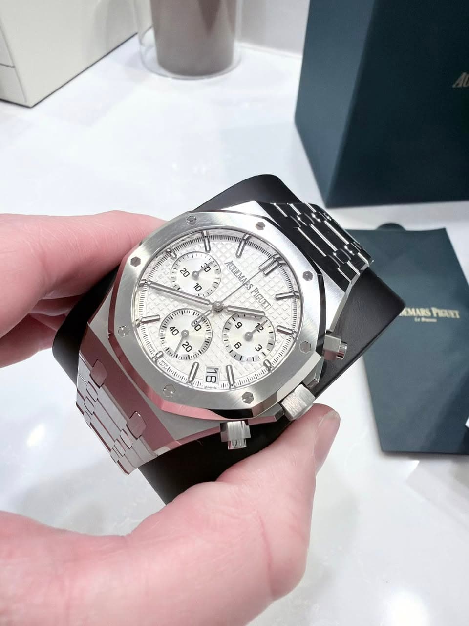May be an image of wrist watch and text