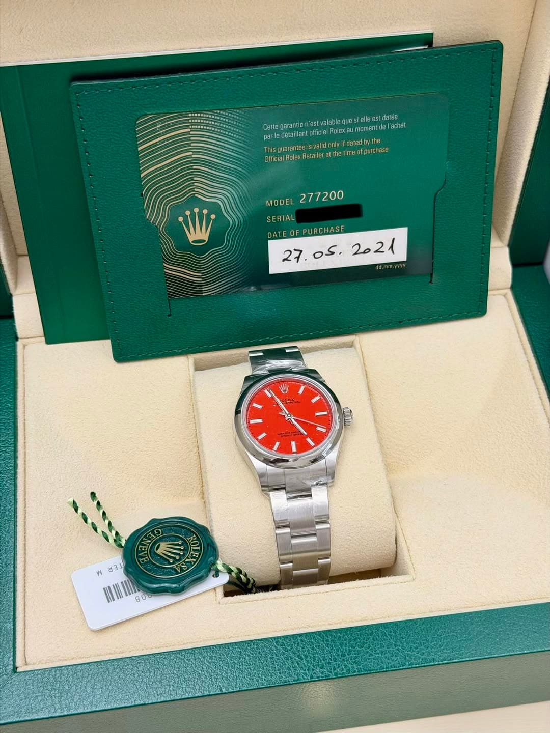 May be an image of wrist watch and text