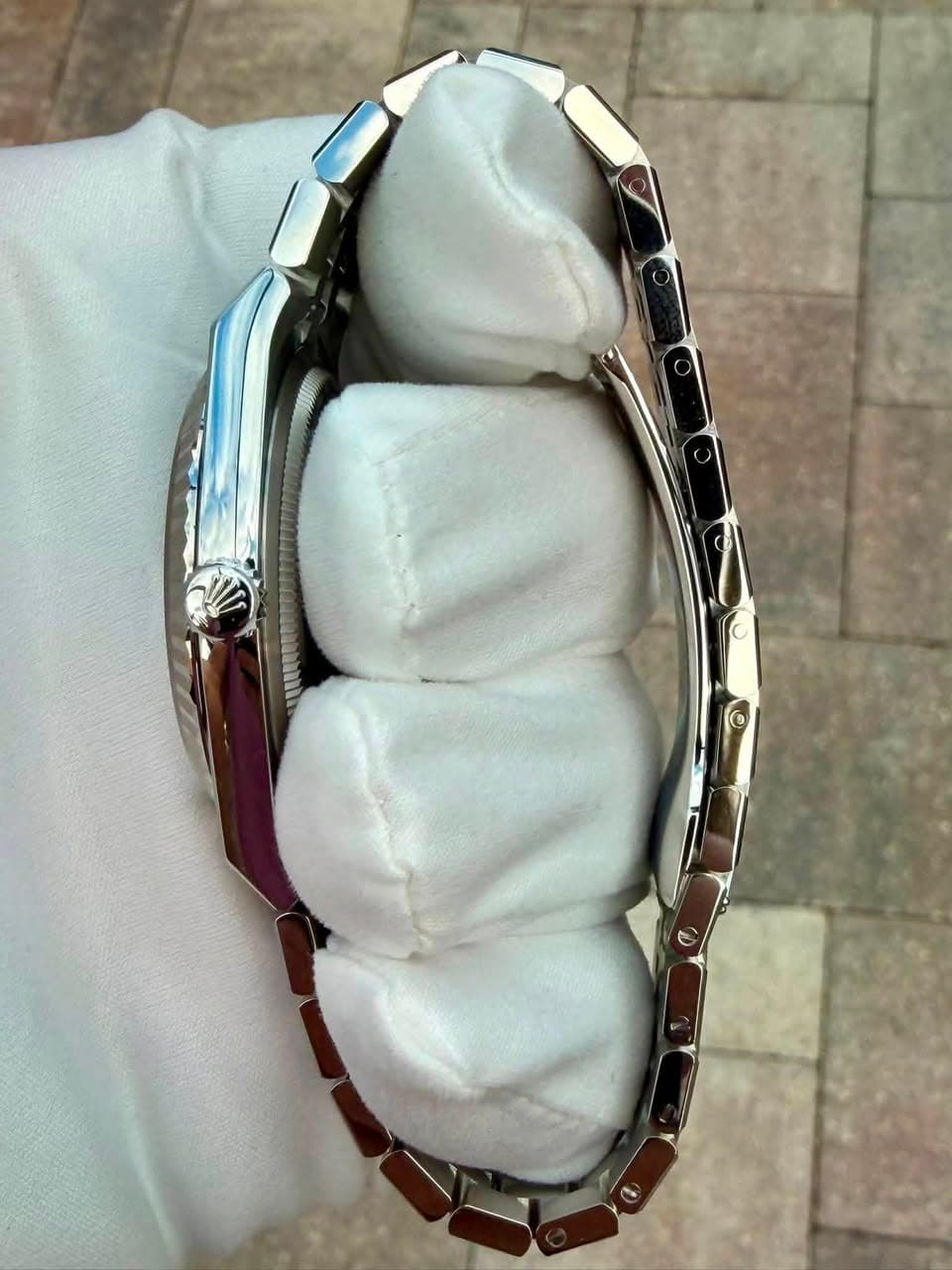 May be an image of jewelry and wrist watch