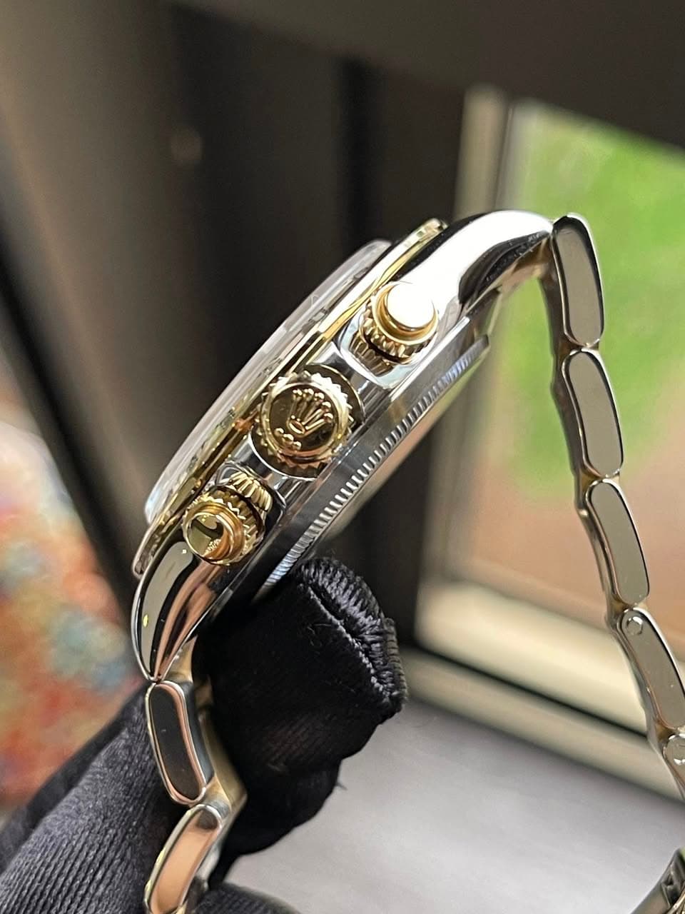 May be an image of wrist watch and text