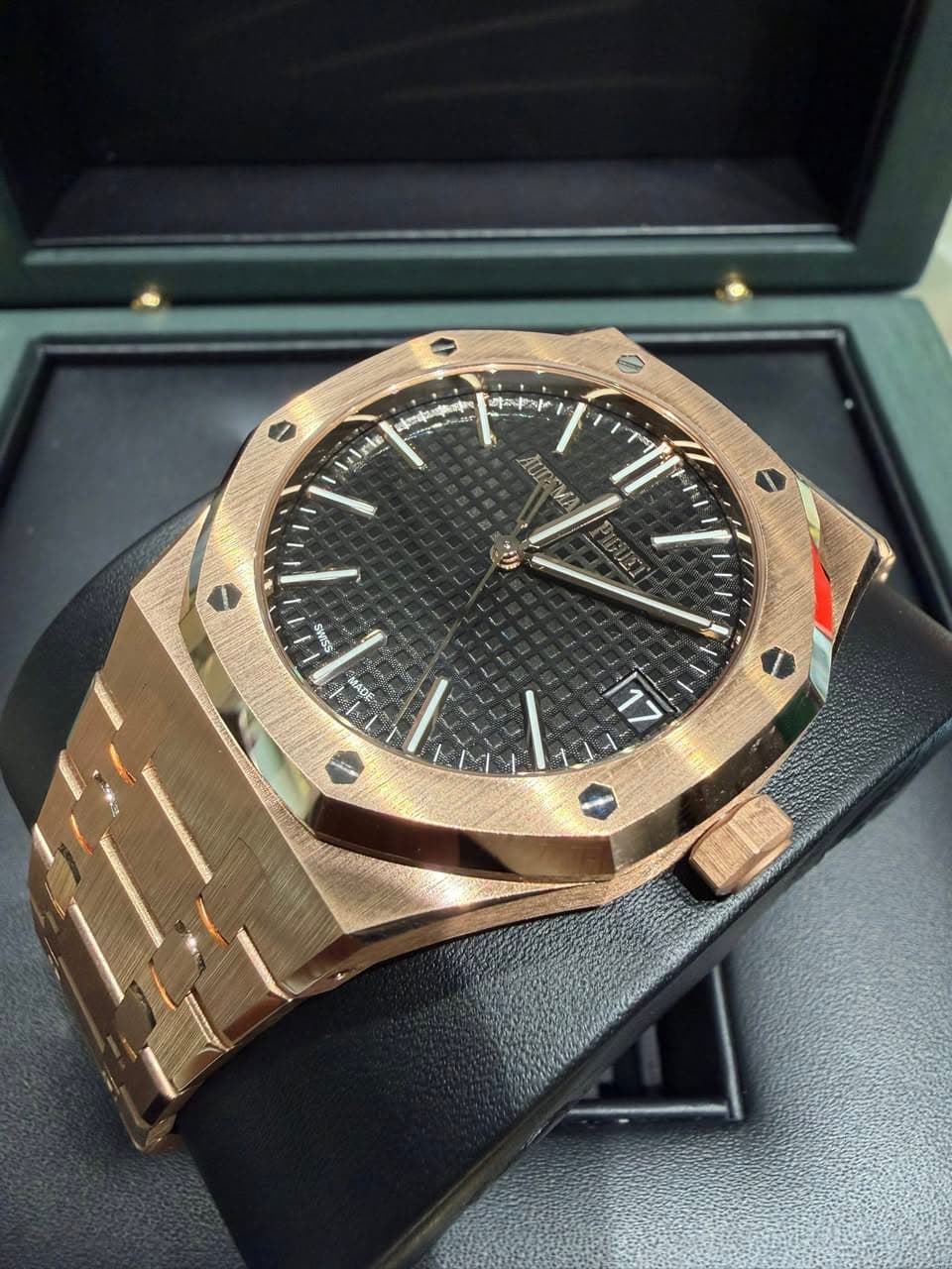 May be an image of wrist watch and text