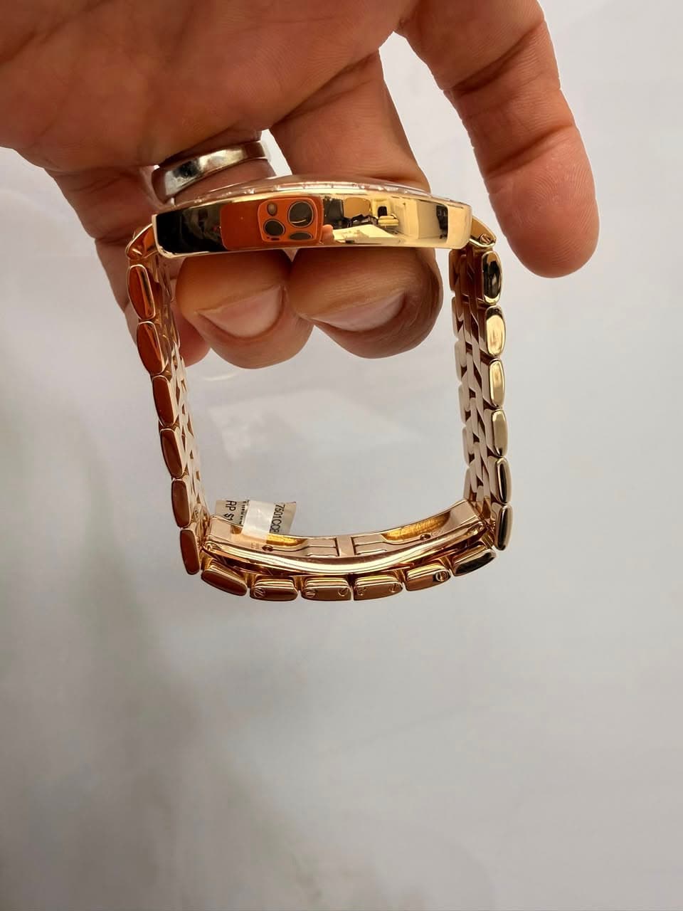 May be an image of jewelry and wrist watch