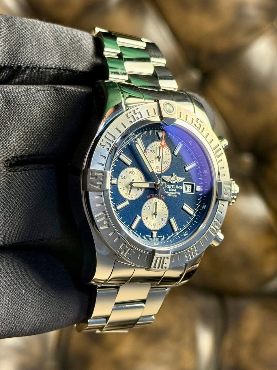 May be an image of wrist watch and text