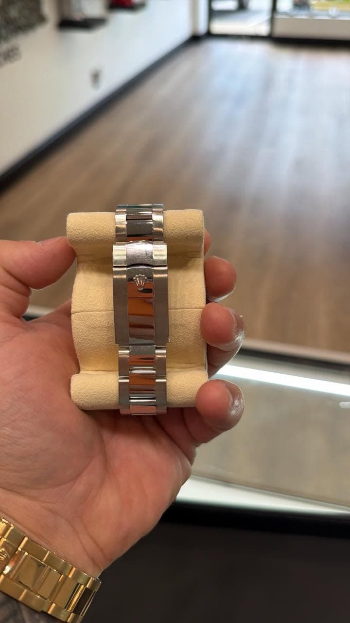 May be an image of wrist watch
